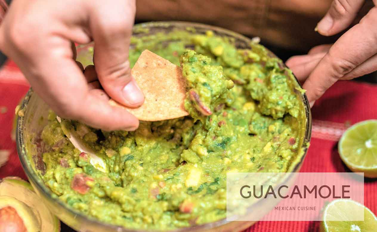 A photo of a bowl of guacamole.